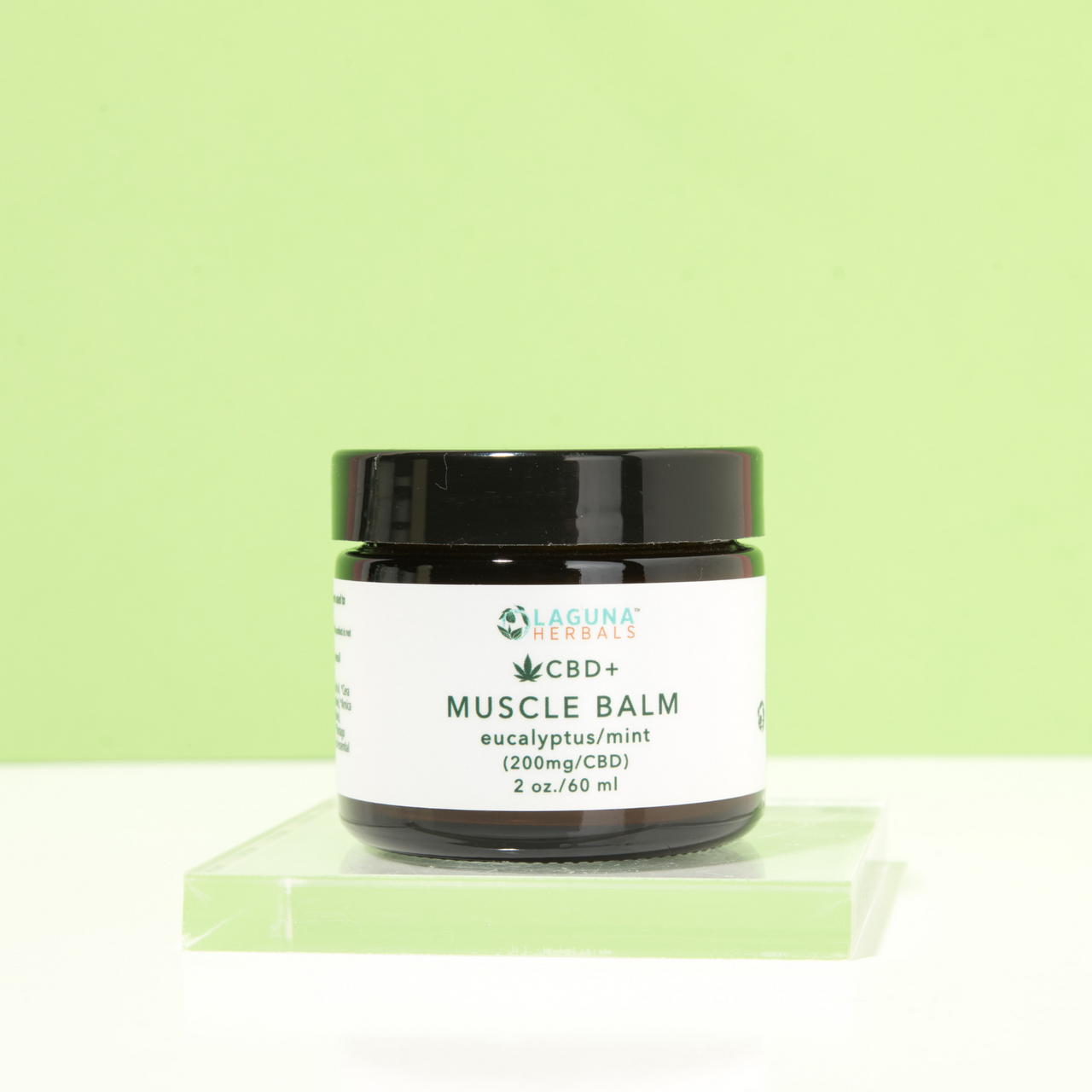 Jar of CBD Muscle Balm with hemp-derived oil for pain relief and muscle soreness