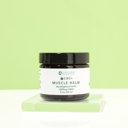 Jar of CBD Muscle Balm with hemp-derived oil for pain relief and muscle soreness