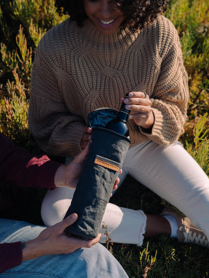 Insulated Wine & Spirits Cooler Tote keeping wine chilled for outdoor dining and picnics