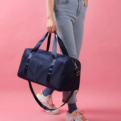 Waterproof fitness sports travel duffel bag with spacious, durable, and organized compartments for men and women.