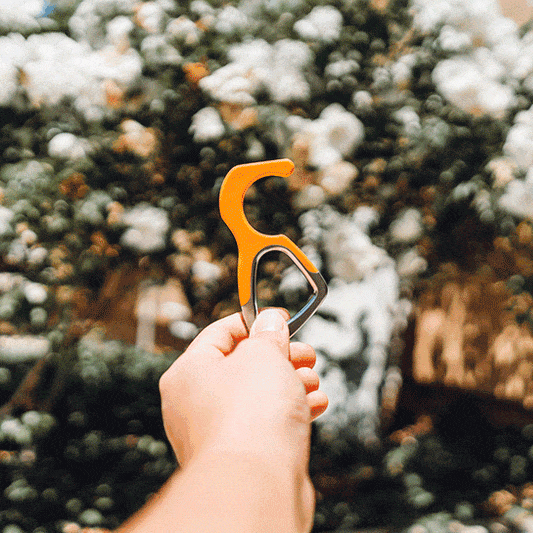 Patented antimicrobial silicone no-touch keychain tool for contact-free use and germ protection