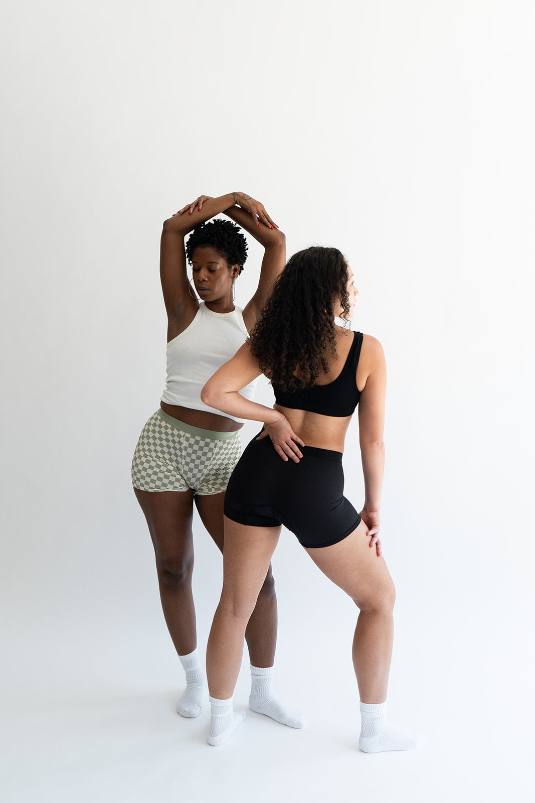 The Starter Bundle featuring 5 pairs of soft, recycled nylon Boxer Brief period underwear for light to regular flow days